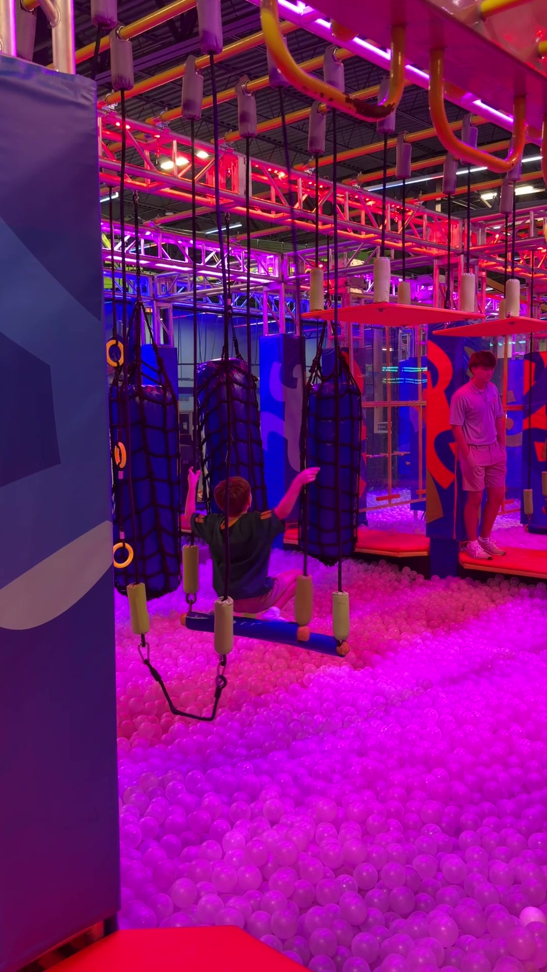 Jumpers flying on wall-to-wall trampoline courts